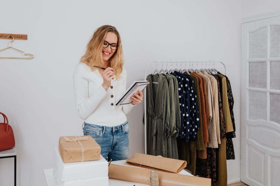 Boutique owner taking stock of her inventory